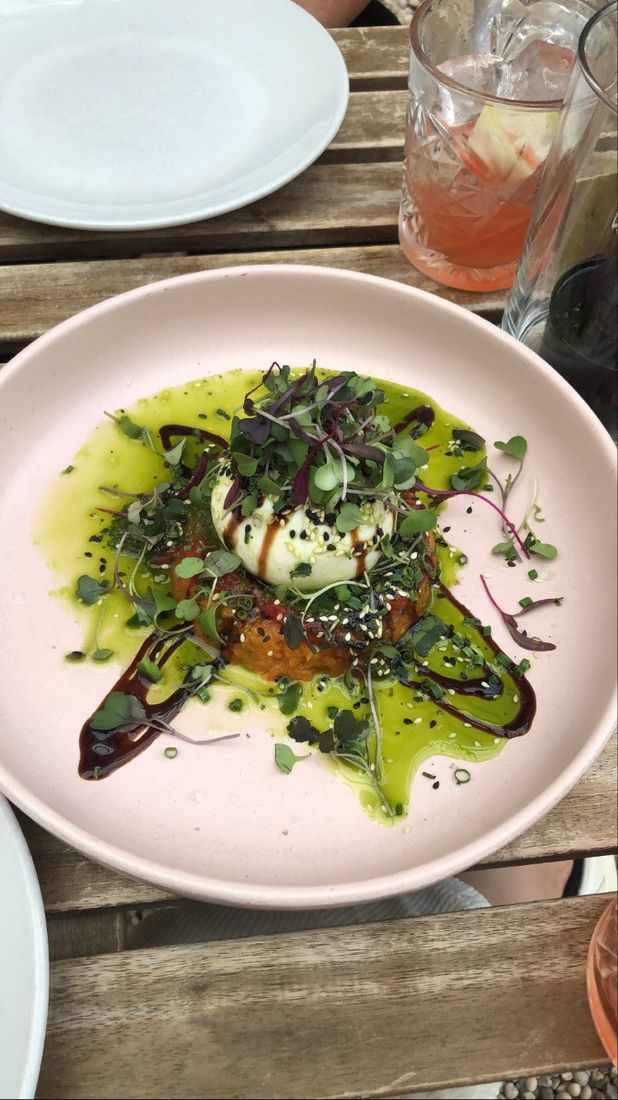 Burrata with charred tomato and greens