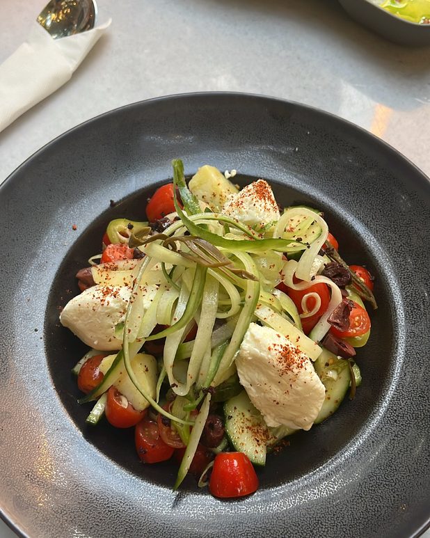 Courgette ribbons, cherry tomatoes and mozzarella